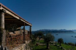 a house with a view of a lake at La Casa sopra il Castello - Portovenere in Portovenere