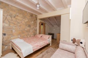 Кровать или кровати в номере Ostroške grede