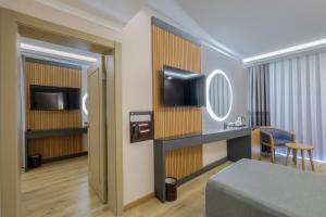 TV a/nebo společenská místnost v ubytování Alba Resort Hotel - Ultra All Inclusive