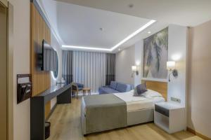 Postel nebo postele na pokoji v ubytování Alba Resort Hotel - Ultra All Inclusive