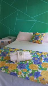 Postel nebo postele na pokoji v ubytování Villa dos Pássaros Paraty Hospedagem