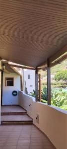 an empty porch with stairs and a view at Casa Pepito in Agulo