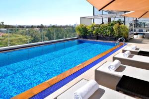 a swimming pool on the roof of a building at Four Points By Sheraton Nairobi Hurlingham in Nairobi