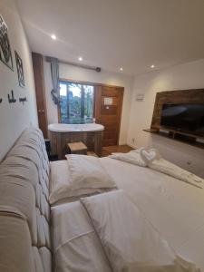Recanto dos Moinhos - Boutique Hotel客房内的一张或多张床位