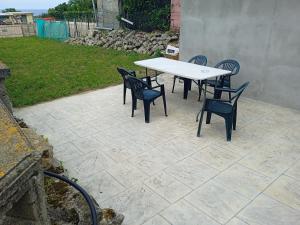 Patio lub wspólna przestrzeń na świeżym powietrzu w obiekcie Casa San Miguel 93 santander