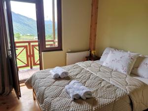 Letto o letti in una camera di Hotel Lamala