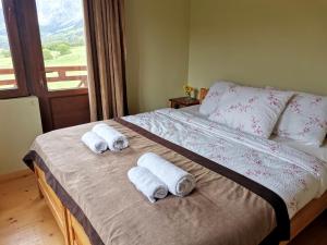 Letto o letti in una camera di Hotel Lamala