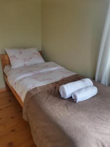 Letto o letti in una camera di Hotel Lamala