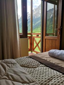 Letto o letti in una camera di Hotel Lamala