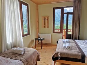Letto o letti in una camera di Hotel Lamala