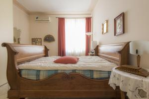A bed or beds in a room at B&B - Il Portichetto