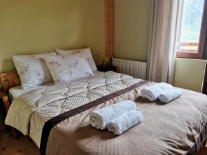 Letto o letti in una camera di Hotel Lamala