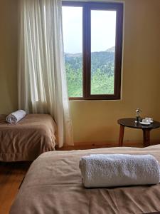 Letto o letti in una camera di Hotel Lamala