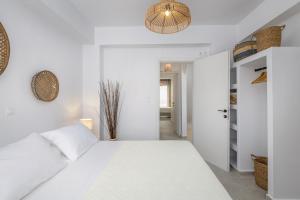 A bed or beds in a room at Suites 33