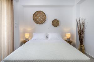 A bed or beds in a room at Suites 33