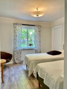 Ένα ή περισσότερα κρεβάτια σε δωμάτιο στο Holiday Home Småland Paradiset +12 φωτογραφίες
