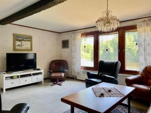 TV a/nebo společenská místnost v ubytování Holiday Home Småland Paradiset