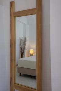 A bed or beds in a room at Suites 33