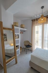 A bed or beds in a room at Suites 33