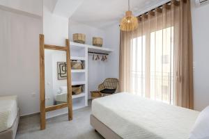 A bed or beds in a room at Suites 33