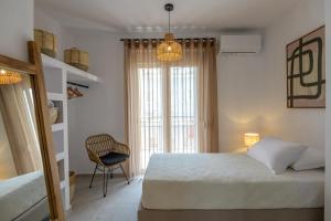 A bed or beds in a room at Suites 33