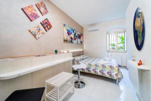 Postel nebo postele na pokoji v ubytování B&B Eraclio
