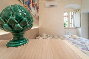 Postel nebo postele na pokoji v ubytování B&B Eraclio