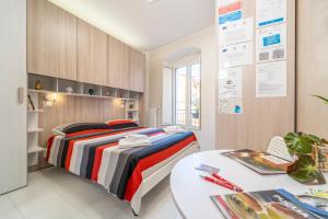 Postel nebo postele na pokoji v ubytování B&B Eraclio