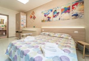 Postel nebo postele na pokoji v ubytování B&B Eraclio
