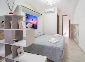 Postel nebo postele na pokoji v ubytování B&B Eraclio