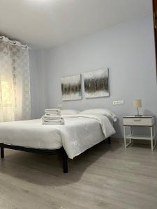 Ένα ή περισσότερα κρεβάτια σε δωμάτιο στο Lemos Luna