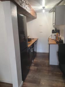 Dapur atau dapur kecil di Charmant petit studio proche départ GR20