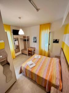 Кровать или кровати в номере Hotel Lido Vieste