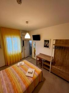 Кровать или кровати в номере Hotel Lido Vieste