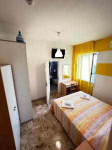 Кровать или кровати в номере Hotel Lido Vieste