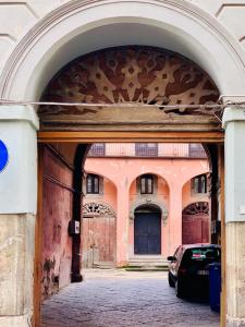 an entrance to a building with a car parked in it at 900 Bed and Breakfast in Nola