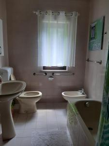 Vonios kambarys apgyvendinimo įstaigoje TERRAZZA SUL BORGO