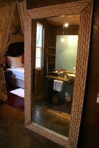 Ένα μπάνιο στο Jardin d'ébène Boutique Guesthouse