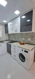 Kuchyňa alebo kuchynka v ubytovaní APARTAMENTO HECO