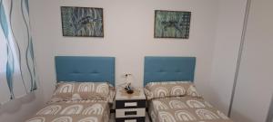 Posteľ alebo postele v izbe v ubytovaní APARTAMENTO HECO
