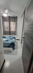 Posteľ alebo postele v izbe v ubytovaní APARTAMENTO HECO