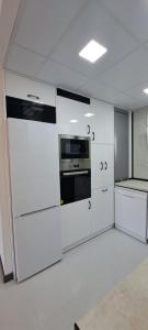 Kuchyňa alebo kuchynka v ubytovaní APARTAMENTO HECO
