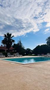 The swimming pool at or close to I Giardini Dell'Agave