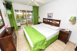 Voodi või voodid majutusasutuse Jolly Beach Antigua - All Inclusive toas
