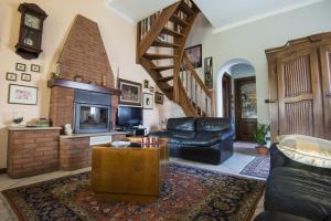 A television and/or entertainment centre at B&B - Il Portichetto