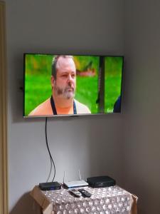 TV o dispositivi per l'intrattenimento presso Villa Amada a place to relax and take a rest