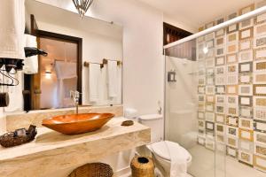 Um banheiro em Paraíso Ecológico Pousada & SPA