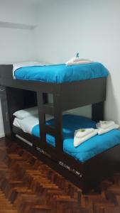 Krevet ili kreveti na kat u jedinici u objektu Amplio departamento 3 amb en muy buena ubicación