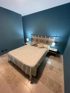 Ένα ή περισσότερα κρεβάτια σε δωμάτιο στο CASA BRIONIS