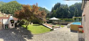 a house with a garden and a swimming pool at dream house in Stazzema +50 photos